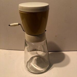 Retro Gemco nut grinder, comes with glass bottom, plastic grinder and lid.